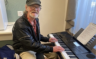 Colin playing on an electric piano